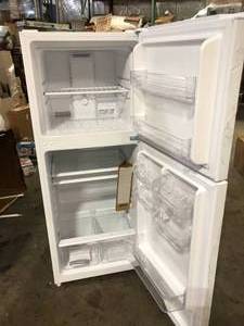 lot 7 image: Magic Chef 10.1 cu. ft. Top Freezer Refrigerator in White Damaged on top   Customer Returns See Pictures