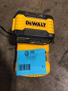 lot 11 image: Dewalt Battery and Charger    Customer Returns See Pictures