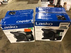 lot 21 image: Lot of 2 Lasko 11.2 in. 3 Speeds Blower Fan in Gray with Carry Handle, Circuit Breaker, Power Outlets, High Velocity Utility PivotingCustomer Returns See Pictures
