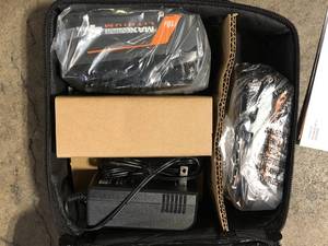 RIDGID 18V MAX Output 4.0 Ah and 2.0 Ah Batteries with 18V Charger   Customer Returns See Pictures