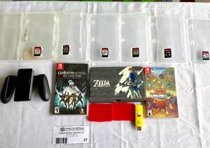 lot 37 image: Nintendo Switch Games, Zelda Case, and Controller