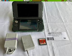 lot 38 image: Legend of Zelda Limited Edition Nintendo 3DS XL Gaming Console with Power Supply