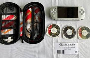lot 39 image: Playstation PSP Handheld Console with 3 Games and Case