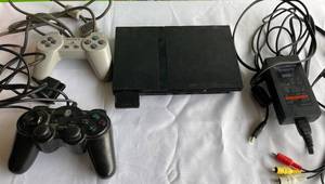 lot 28 image: PS2 Console with 2 Wired Controllers, Power Supply and Memory Card
