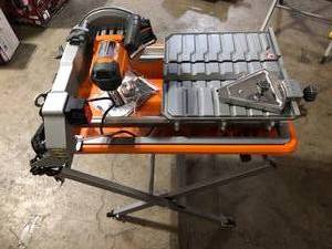 RIDGID 9 Amp 7 in. Blade Corded Wet Tile Saw with Stand  Customer Returns See Pictures