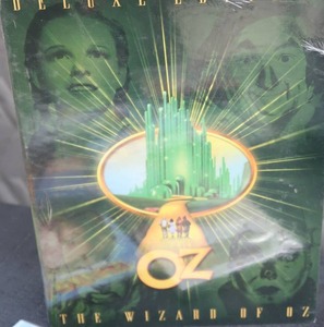 lot 41 image: 9 DVDS PLUS UNOPENED VHS VERSION OF WIZ OF OZ AND THE GODFATHER