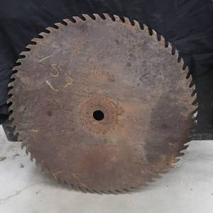 lot 90 image: VINTAGE ROUND SAW BLADE