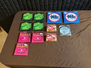 lot 90 image: GuitarBass Strings and 2 Tuners