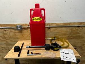 lot 64 image: FLO-FAST Professional Model Pump & 10.5 Gallon Gasoline Container