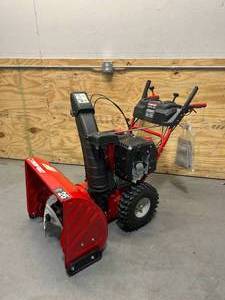 lot 8 image: TROY-BILT Vortex 26 in. 357 cc 3-Stage Self Propelled Gas Snow Blower with Electric Start, Trigger Steering and Heated Grips