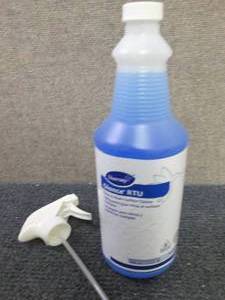 lot 115 image: 7 qt Bottles Diversey Glance RTU...