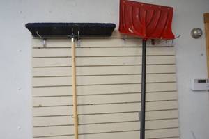 Plastic Red Shovel and Garage Broom