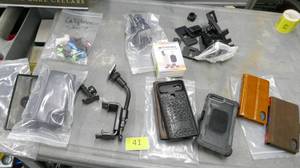 lot 41 image: Variety of cell phone cases, holders, and lens for fun photos