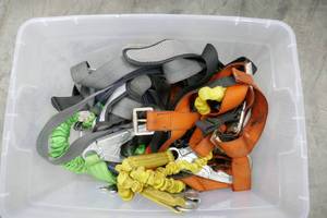 lot 62 image: Tote full of safety harnesses 4 or 5
