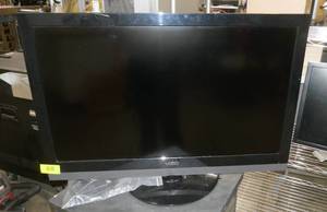 lot 88 image: Vizio E320VP television with remote and HDMI cable