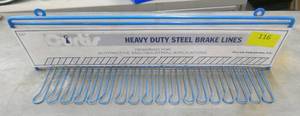 lot 116 image: Curtis brake lines advertising metal sign