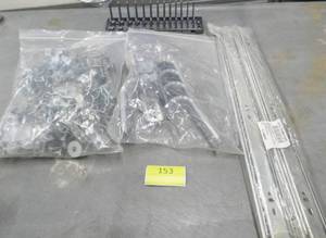 lot 153 image: Misc hardware group - garage hangers, drawer slides, socket holder