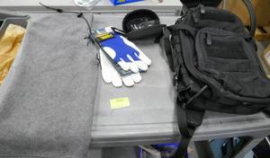 lot 156 image: Headneck warmer, 511 tactical backpack, new gloves, safety glasses