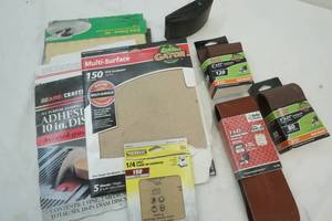 Variety of sandpaper and sanding block