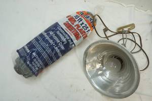 Clamp light and roll of 4ml plastic 10x25