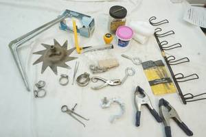 Screws, clamps, used tall kitchen bags, coat hanger