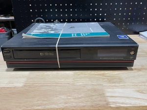 lot 64 image: GE VHS RecorderPlayer