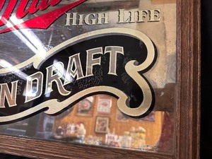 lot 331 image: 1980s Miller Brewing Co. Miller High Life on Draft BarPub Mirror Sign in Wooden Frame