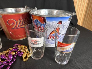 lot 334 image: Misc. Set of Miller Pilsner Pint Glasses, Pitchers, and Miller and Coors Beer Buckets