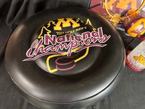 lot 335 image: Gopher Memorabilia - Inflatable 2002 NCAA Mens National Champions, Over the Door Basketball Hoop, and Crystal Freezer Minnesota Mug