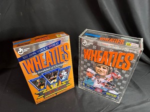 lot 415 image: 1994 Wheaties NFL 75th Anniversary Edition and Wheaties Super Bowl 30th Anniversary Collectors Edition - Both in Protective Boxes