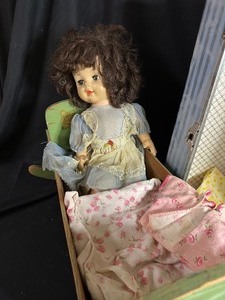 lot 390 image: Vintage Doll Bed and Trunk with Handmade Clothes and Doll