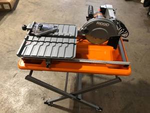 RIDGID 9 Amp 7 in. Blade Corded Wet Tile Saw with Stand   Customer Returns See Pictures