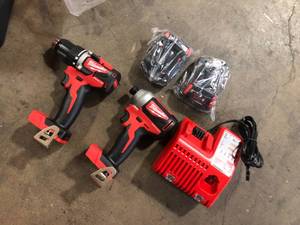 Milwaukee M18 18V Lithium-Ion Brushless Cordless Compact DrillImpact Combo Kit (2-Tool) W (2) 2.0Ah Batteries, Charger & Bag   Customer Returns See Pictures