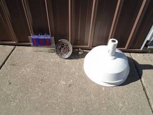 lot 110 image: Porcelan outdoor light shields & sunflower heater. As shown.