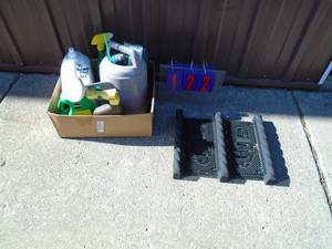 lot 122 image: Lawn chemicals & boot cleaner. As shown.