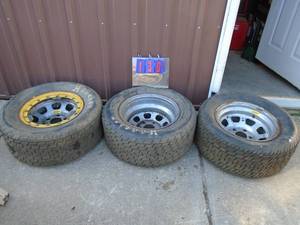 lot 130 image: Qty of 3 wissota 15 tires & wheels. Wheels stamped wissota 2-a 1-b. 4 34 pattern. As shown.