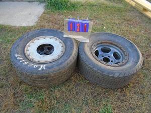 lot 131 image: Qty of 2 wissota 15 tires & wheels stamped wissota. Both are H. As shown.