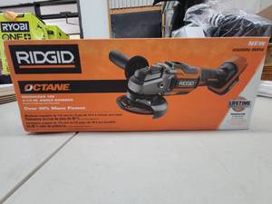 lot 9 image: RIDGID 18V Brushless Cordless 4-12 in. Slide Switch Angle Grinder (Tool Only) - MISSING WRENCH