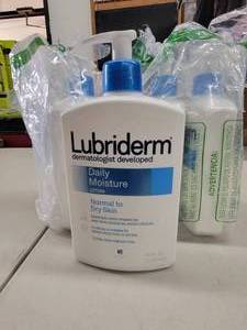 lot 20 image: (5) 16 Oz Bottles by Lubriderm Daily Moisture Lotion Normal to Dry Skin