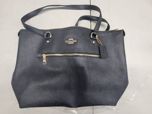 lot 42 image: Coach Black Dempsey Bag in Black - Stitching is coming loose on one Corner.