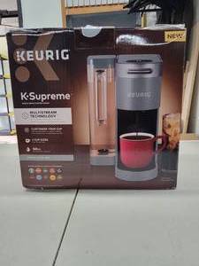 lot 56 image: Keurig K-Supreme Single Serve K-Cup Pod Coffee Maker In Gray - Cant Tell if Ever Used, Works