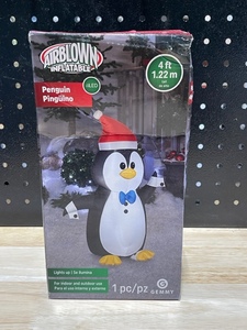 lot 22 image: 4 Foot Inflatable Penguin LED