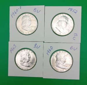 lot 13 image: Four Ben Franklin Silver Half Dollars