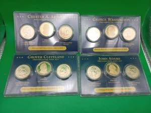 lot 15 image: Collection Of Four Presidential One Dollar Coin Sets