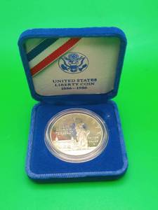 lot 2 image: 1986 Ellis Island United States One Dollar Liberty Silver Coin