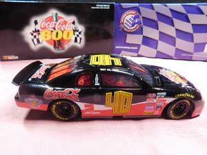 lot 15 image: 1999 Monte Carlo Limited edition Coca-Cola 600 Action racing nascar die cast