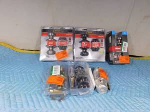 lot 91 image: door knobs and deadbolts with keys