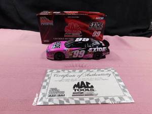 lot 32 image: Mac Tools Limited Edition die cast Jeff Burton Exide Batteries #99 with certificate of authenticity