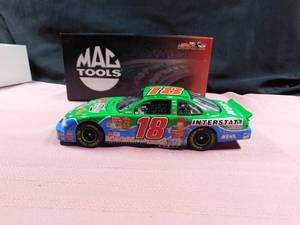 lot 36 image: Mac Tools die cast Bobby Labonte #18 Interstate batteries Muppets 50th anniversary 2002 Grand Prix
