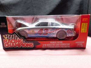 lot 38 image: 1997 Limited Edition Racing Champion die cast Bobby Hamilton #43 STP Nascar